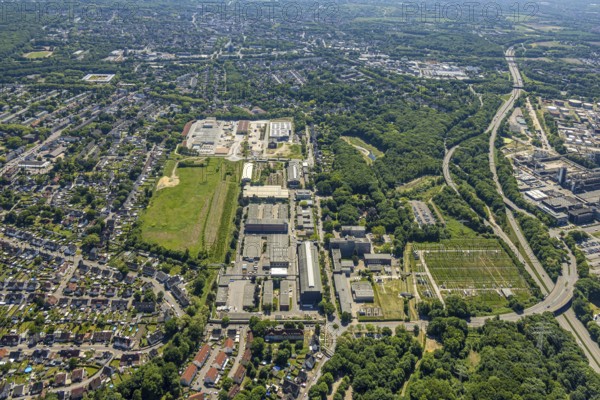 Aerial view, industrial estate Bergmannsglückstraße, construction site and new Meinhövel central warehouse with solar roof Bergmannsglückstraße 14, Hassel, Gelsenkirchen, Ruhr area, North Rhine-Westphalia, Germany