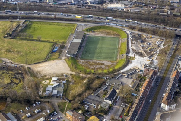 Aerial view, football stadium Glückauf-Kampfbahn with grandstand, DJK Teutonia Schalke-Nord 1921 e.V., construction site Ernst-Kuzorra-Platz, traffic volume on the A42 motorway, Schalke-Nord, Gelsenkirchen, Ruhr area, North Rhine-Westphalia, Germany