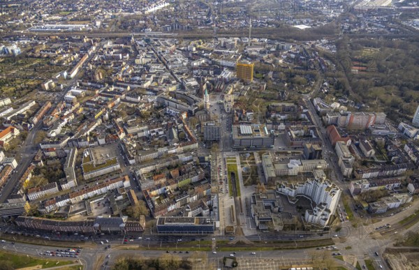 Aerial view, city centre view with Heinrich-König-Platz, Ebertstraße with tram subway, CityHochhaus, and Bahnhofstraße, catholic Propsteikirche St. Augustinus and evang. Emmaus Altstadtkirche, yellow high-rise Hamburg-Mannheimer Jobcenter Agentur für Arbeit, Altstadt, Gelsenkirchen, Ruhr Area, North Rhine-Westphalia, Germany