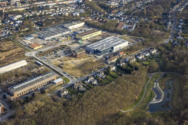 Aerial view, industrial estate Bergmannsglückstraße, site of the former Bergmannsglück colliery on Gartenstadt Körnerstraße, bottom right renaturalisation of Picksmühlenbach, Hassel, Gelsenkirchen, Ruhr area, North Rhine-Westphalia, Germany