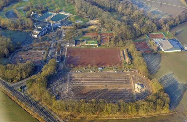 Aerial view, Selbachpark, sports field football stadium 1. FC Pelkum e.V. and tennis courts, construction site athletics stadium, Hotel Selbachpark GmbH and outdoor swimming pool Selbachpark, district Pelkum, Hamm, Ruhr area, North Rhine-Westphalia, Germany