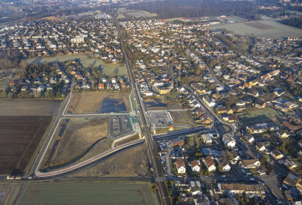 Aerial view, residential area Westtünnen, planned local transport connection with stop in Westtünnen, construction site at Südfeldweg and Von-Thünen-Straße for the future railway stop, railway line with railway bridge and housing estate with roundabout, car parks, possible building area Dierhagenweg, district Rhynern, Hamm, Ruhr area, North Rhine-Westphalia, Germany