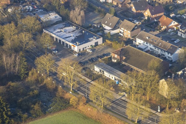 Aerial view, residential area Heessener Straße from Seeburger Straße to An der Mattenbecke with Basic Fit fitness centre and ruins of the car wash, opposite planned building for Bildungszentrum Nord, Heessen district, Hamm, Ruhr area, North Rhine-Westphalia, Germany