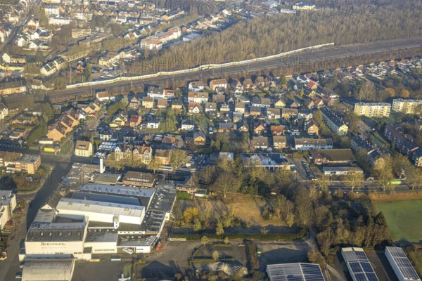 Aerial view, residential area Heessener Straße from Seeburger Straße to An der Mattenbecke with Basic Fit fitness centre and ruins of the car wash, opposite planned building for Bildungszentrum Nord, Heessen district, Hamm, Ruhr area, North Rhine-Westphalia, Germany