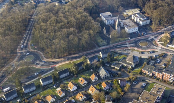 Aerial view, on the left new roundabout Hammer Straße and Bülowstraße, new roundabout Hammer Straße and Friedrich-Ebert-Straße next to the evang. Kreuzkirche parish with kindergarten, undten evangelisch-freikirchliche Gemeinde Bockum-Hövel (Baptisten), forest area, Bockum-Hövel, Hamm, Ruhr area, North Rhine-Westphalia, Germany
