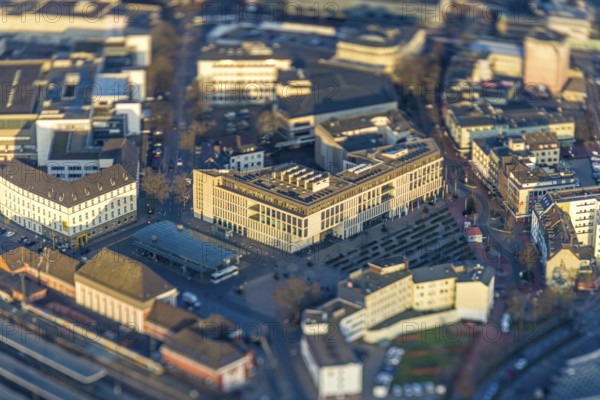 ATTENTION Photos with partial blurring caused by tilt technique on the lens side, aerial view, station forecourt Platz der Deutschen Einheit with VHS, city library and Heinrich-von-Kleist-Forum, centre, Hamm, Ruhr area, North Rhine-Westphalia, Germany