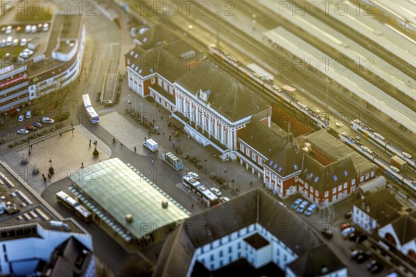 ATTENTION Photos with partial blurring created by tilt technique on the lens side, aerial view, main station Hbf and station forecourt with ZOB bus station, centre, Hamm, Ruhr area, North Rhine-Westphalia, Germany