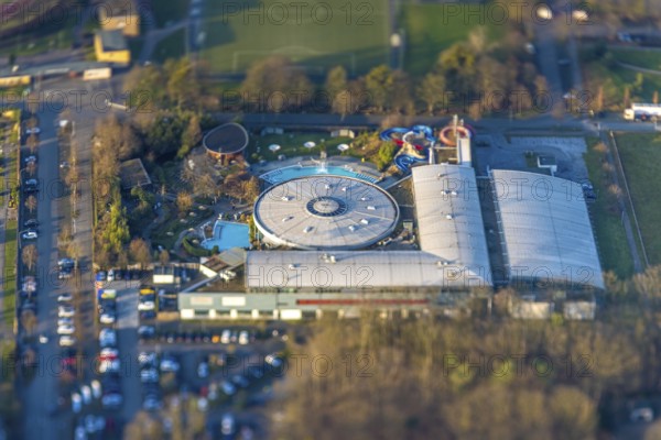 ATTENTION Photos with partial blurring caused by tilt technique on the lens side, aerial view, MAXIMARE adventure pool and wellness pool with indoor pool, centre, Hamm, Ruhr area, North Rhine-Westphalia, Germany