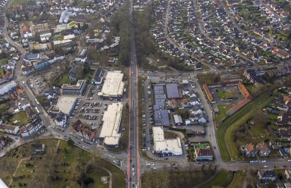 Aerial view, Dortmunder Straße shopping centre with DM, Rewe, Aldi and Edeka supermarket, St. Victor's church, building site with new building, Herringen market and centre, old Herringen building yard, Herringen district, Hamm, Ruhr area, North Rhine-Westphalia, Germany