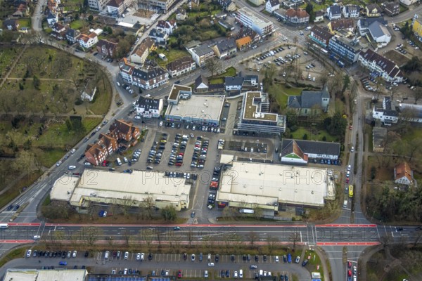 Aerial view, Dortmunder Straße shopping centre with DM, Aldi and Edeka supermarket, Evangelical St. Victor's Church, construction site with new building, Herringen centre, Herringen district, Hamm, Ruhr area, North Rhine-Westphalia, Germany