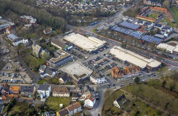 Aerial view, Dortmunder Straße shopping centre with DM, Aldi and Edeka supermarket, St. Victor's Lutheran Church, construction site with new building, Herringer Zentrum, Herringen district, Hamm, Ruhr area, North Rhine-Westphalia, Germany
