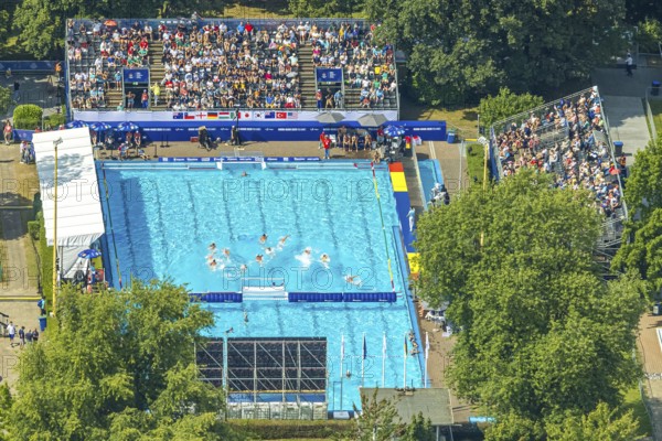 Aerial view, sports park with outdoor swimming pool swimming stadium ASC Dusiburg at Kruppstraße, water polo competition with spectators on stands, World Student Games FISU World University Games 2025, Rhine-Ruhr 2025, Neudorf, Duisburg, Ruhr area, North Rhine-Westphalia, Germany, bathing establishment, bathing resort, DE, Europe, outdoor swimming pool, aerial view, aerial photography, aerial photography, swimming pool, swimming pool, sports, overview, bird's eye view, birds-eyes view, overview