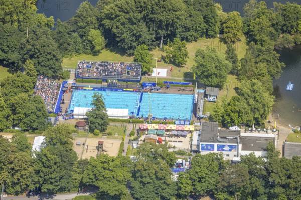 Aerial view, sports park with outdoor swimming pool swimming stadium ASC Dusiburg at Kruppstraße, water polo competition with spectators on stands, World Student Games FISU World University Games 2025, Rhine-Ruhr 2025, Neudorf, Duisburg, Ruhr area, North Rhine-Westphalia, Germany, bathing establishment, bathing resort, DE, Europe, outdoor swimming pool, aerial view, aerial photography, aerial photography, swimming pool, swimming pool, sports, overview, bird's eye view, birds-eyes view, overview