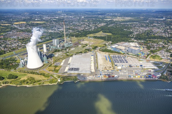 Aerial view, logport VI (six) Walsum, industrial estate and construction site with new building at the STEAG Walsum power station on the Rhine, steaming cooling tower, Alt-Walsum, Duisburg, Ruhr area, North Rhine-Westphalia, Germany, construction work, construction area, construction site, building land, construction project, construction site, DE, Duisburg-Nord, Europe, commercial enterprises, commercial area, commercial area, commercial property, business park, commercial location, commercial use, large construction site, freight transport, combined heat and power plant, industrial area, industrial location, power plant, logistics, logistics service, logistics service provider, logistics provider, logistics centre, aerial view, aerial photography, aerial photography, new construction, transport service, overview, bird's eye view, birds-eyes view, logport 6 (Six), logport VI Walsum, multimodal logistics centre, overview