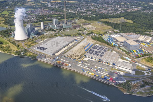 Aerial view, logport VI (six) Walsum, industrial estate and construction site with new building at the STEAG Walsum power station on the Rhine, steaming cooling tower, Alt-Walsum, Duisburg, Ruhr area, North Rhine-Westphalia, Germany, construction work, construction area, construction site, building land, construction project, construction site, DE, Duisburg-Nord, Europe, commercial enterprises, commercial area, commercial area, commercial property, business park, commercial location, commercial use, large construction site, freight transport, combined heat and power plant, industrial area, industrial location, power plant, logistics, logistics service, logistics service provider, logistics provider, logistics centre, aerial view, aerial photography, aerial photography, new construction, transport service, overview, bird's eye view, birds-eyes view, logport 6 (Six), logport VI Walsum, multimodal logistics centre, overview