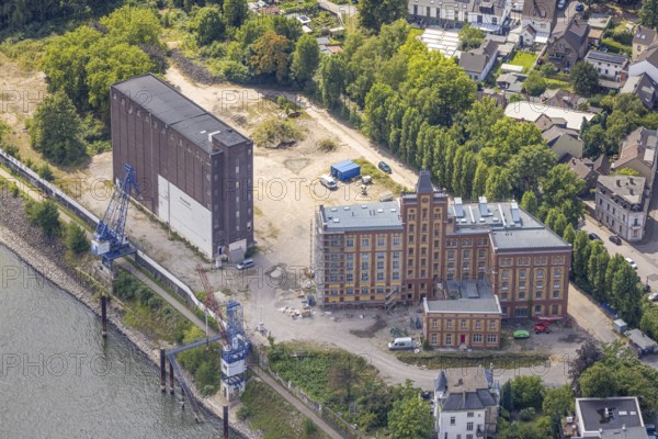 Aerial view, Plangemühle an der Königstraße, construction site with facade scaffolding, Alt-Homberg, Duisburg, Ruhr area, North Rhine-Westphalia, Germany, DE, Duisburg-West, Europe, factory castle, aerial view, aerial photography, aerial photography, Plange Mühle, overview, bird's eye view, birds-eyes view, historical place, overview