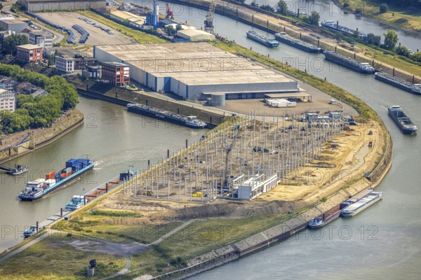 Aerial view, Mercatorinsel inland navigation on Vinckekanal and harbour canal, Stangenwald construction site with new logistics hall, Ruhrort, Duisburg, Ruhr area, North Rhine-Westphalia, Germany, construction work, construction area, building site, building plots, construction project, construction site, DE, Europe, harbour, aerial view, aerial photography, aerial photography, Mercator Island, new construction, overview, bird's-eye view, overview