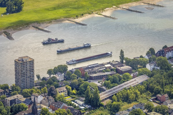 Aerial view, inland navigation on the Rhine past the Hotel Rheingarten high-rise building, abandoned former factory Schmitz Söhne Maschinenbau, Schiffersteig, Alt-Homberg, Duisburg, Ruhr area, North Rhine-Westphalia, Germany, DE, Europe, aerial view, aerial photography, aerial photography, overview, bird's-eye view, overview