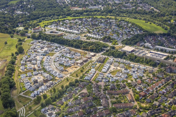Aerial view, Duisburg-Süd, residential area Angerbogen, Am Alten Angerbach, semi-circular new housing estate, commercial area Xella International GmbH and Edeka E-Center Angerbogen, roofed railway station Angerbogen, behind the Rahmer See, Huckingen, Duisburg, Ruhr area, North Rhine-Westphalia, Germany, Ruh
