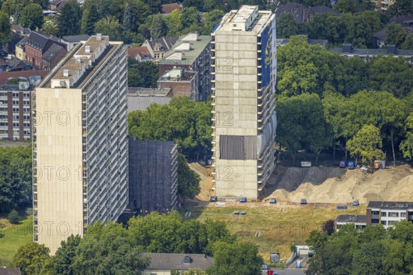 Aerial view, white giant high-rise buildings, social hotspot, three days in front of the demolition of one of the high-rise buildings, Hochheide, Duisburg, Ruhr area, North Rhine-Westphalia, Germany, DE, Europe, property tax, real estate, aerial photograph, aerial photography, aerial photography, demolition, overview, bird's-eye view, residential complex, housing and living, residential area, residential quality, residential neighbourhood, housing estate, residential district, birds-eyes view, overview, social hotspot