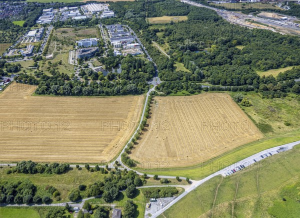 Aerial view, business park Asterlagen and park, meadow area and area for new animal shelter Essenberger Straße, Bergheim, Duisburg, Ruhr area, North Rhine-Westphalia, Germany, DE, Europe, commercial enterprises, commercial area, commercial property, commercial park, commercial site, commercial use, industrial area, industrial site, aerial photograph, aerial photography, aerial photography, overview, bird's-eye view, bird's-eye view, overview