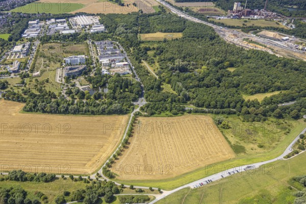Aerial view, business park Asterlagen and park, meadow area and area for new animal shelter Essenberger Straße, Bergheim, Duisburg, Ruhr area, North Rhine-Westphalia, Germany, DE, Europe, commercial enterprises, commercial area, commercial property, commercial park, commercial site, commercial use, industrial area, industrial site, aerial photograph, aerial photography, aerial photography, overview, bird's-eye view, bird's-eye view, overview