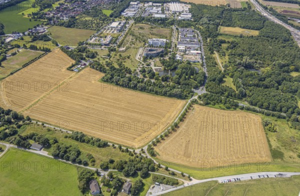 Aerial view, business park Asterlagen and park, meadow area and area for new animal shelter Essenberger Straße, Bergheim, Duisburg, Ruhr area, North Rhine-Westphalia, Germany, DE, Europe, commercial enterprises, commercial area, commercial property, commercial park, commercial site, commercial use, industrial area, industrial site, aerial photograph, aerial photography, aerial photography, overview, bird's-eye view, bird's-eye view, overview