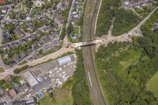 Aerial view, construction site with new bridge An der Cölve over railway tracks, Moers-Schwafheim, Mörs, Ruhr area, North Rhine-Westphalia, Germany, construction work, construction area, building site, building plots, construction project, construction site, bridge, DE, Duisburg, Europe, aerial view, aerial photography, aerial photography, new building, overview, bird's-eye view, bird's-eye view, overview