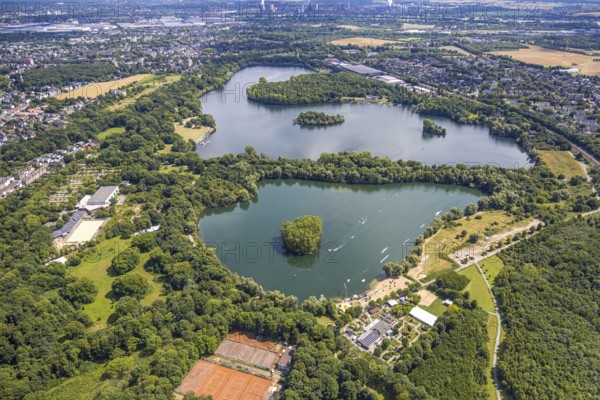 Aerial view, Toeppersee and Tegge with water ski facility and leisure facility, surrounded by housing estates and railway tracks, Rumeln-Kaldenhausen, Duisburg, Ruhr area, North Rhine-Westphalia, Germany, DE, Europe, leisure facility, tracks, aerial view, aerial photography, aerial photography, lake, overview, bird's eye view, birds-eyes view, green lung, overview