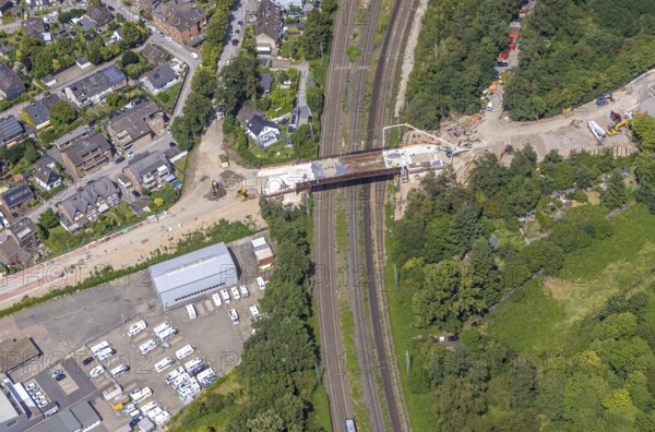 Aerial view, construction site with new bridge An der Cölve over railway tracks, Moers-Schwafheim, Mörs, Ruhr area, North Rhine-Westphalia, Germany, construction work, construction area, building site, building plots, construction project, construction site, bridge, DE, Duisburg, Europe, aerial view, aerial photography, aerial photography, new building, overview, bird's-eye view, bird's-eye view, overview