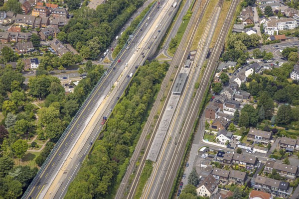 Aerial view, S-Bahn station platform Duisburg-Buchholz Südstraße and motorway A59 with green strip in between, Buchholz, Duisburg, Ruhr area, North Rhine-Westphalia, Germany