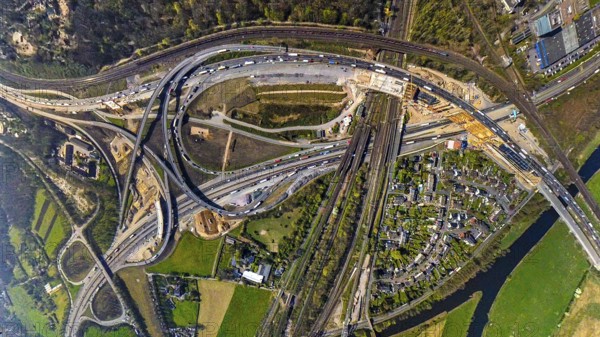 Aerial view, motorway junction Kaiserberg with motorway A3 and motorway A40, bridge construction and construction site rainwater retention basin, earth globe, fisheye image, 360 degree image, tiny world, little planet, fisheye image, Duissern, Duisburg, Ruhr area, North Rhine-Westphalia, Germany