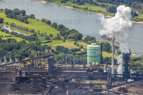 Aerial view, Hüttenwerke Krupp Mannesmann HKM, gasometer and river Rhine, smoke cloud, Hüttenheim, Duisburg, Ruhr area, North Rhine-Westphalia, Germany