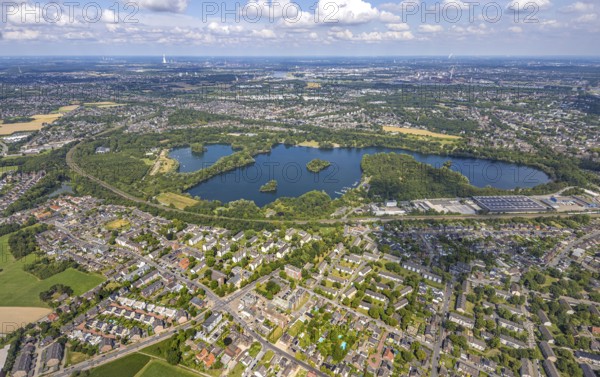 Aerial view, Toeppersee and Tegge with water skiing and leisure facilities, surrounded by housing estates and railway tracks, Rumeln-Kaldenhausen, Duisburg, Ruhr area, North Rhine-Westphalia, Germany