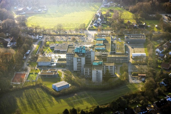 Aerial view, Berufsförderungswerk Hamm educational institution with construction site in the fog, Rhynern district, Hamm, Ruhr area, North Rhine-Westphalia, Germany