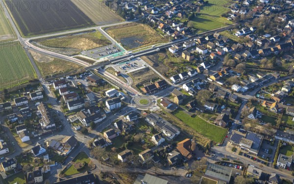 Aerial view, planned local transport connection with stop in Westtünnen, construction site at Südfeldweg and Von-Thünen-Straße for the future railway stop, railway line with railway bridge and housing estate with roundabout, Rhynern district, Hamm, Ruhr area, North Rhine-Westphalia, Germany
