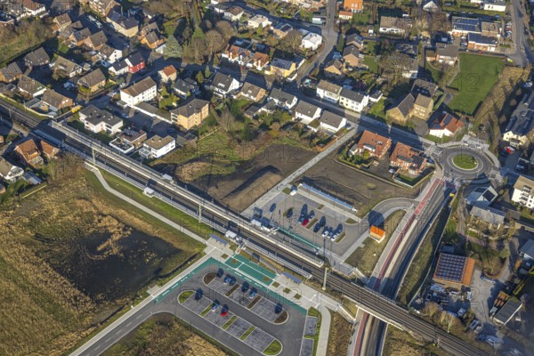 Aerial view, planned local transport connection with stop in Westtünnen, construction site at Südfeldweg and Von-Thünen-Straße for the future railway stop, railway line with railway bridge and housing estate with roundabout, Rhynern district, Hamm, Ruhr area, North Rhine-Westphalia, Germany