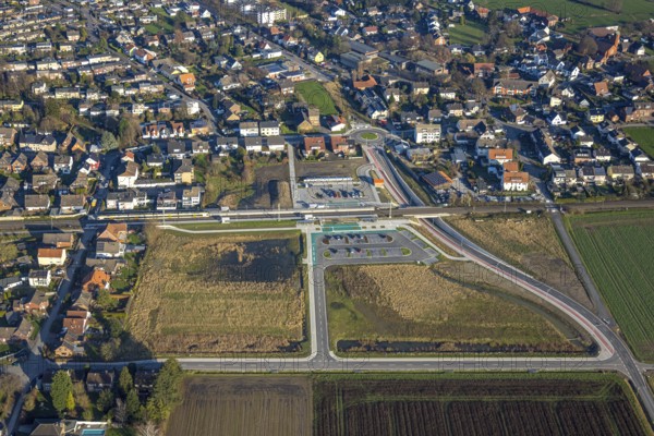 Aerial view, planned local transport connection with stop in Westtünnen, construction site at Südfeldweg and Von-Thünen-Straße for the future railway stop, railway line with railway bridge and housing estate with roundabout, Rhynern district, Hamm, Ruhr area, North Rhine-Westphalia, Germany