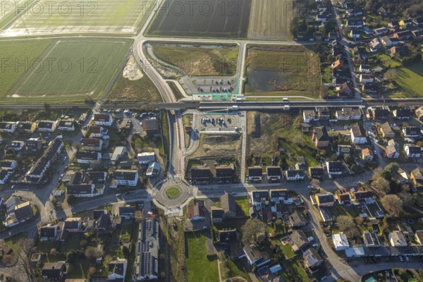 Aerial view, planned local transport connection with stop in Westtünnen, construction site at Südfeldweg and Von-Thünen-Straße for the future railway stop, railway line with railway bridge and housing estate with roundabout, Rhynern district, Hamm, Ruhr area, North Rhine-Westphalia, Germany