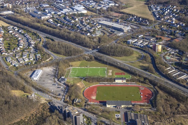 Aerial view, Erich-Berlet-Stadion, formerly Kirchenbergstadion, football stadium and athletics stadium with adjacent pitch, on the A46 motorway, refugee accommodation container village Kirchenberg, Hohenlimburg, Hagen, Ruhr area, North Rhine-Westphalia, Germany