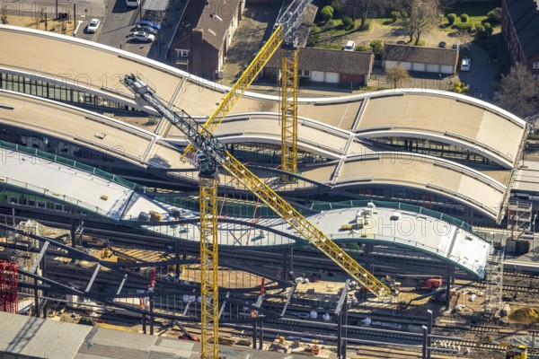 Aerial view, main station Hbf major construction site with new track hall and station forecourt east, construction work on station roof (Die Welle), Dellviertel, Duisburg, Ruhr area, North Rhine-Westphalia, Germany