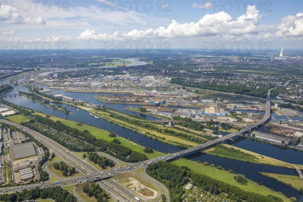 Aerial view, Berlin bridge of motorway A59 over river Ruhr and Rhine-Herne-Canal between motorway junction Dusiburg and harbour Duisburg, distant view and blue sky with clouds, Duissern, Duisburg, Ruhr area, North Rhine-Westphalia, Germany