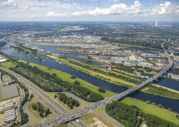 Aerial view, Berlin bridge of motorway A59 over river Ruhr and Rhine-Herne-Canal between motorway junction Dusiburg and harbour Duisburg, distant view and blue sky with clouds, Duissern, Duisburg, Ruhr area, North Rhine-Westphalia, Germany