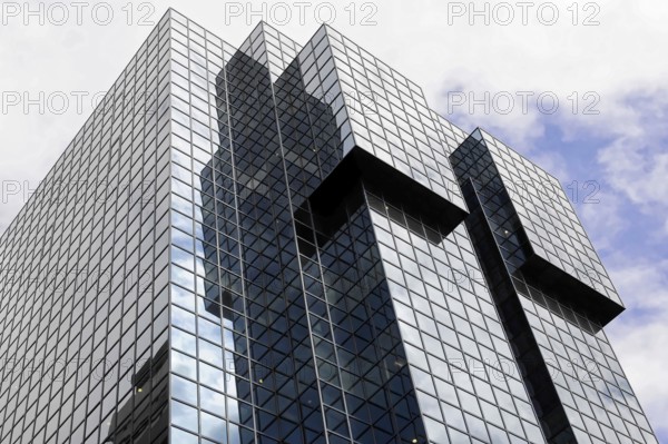 London, England, Great Britain, Modern building with mirrored glass façade and cloud reflections, London, England, Great Britain
