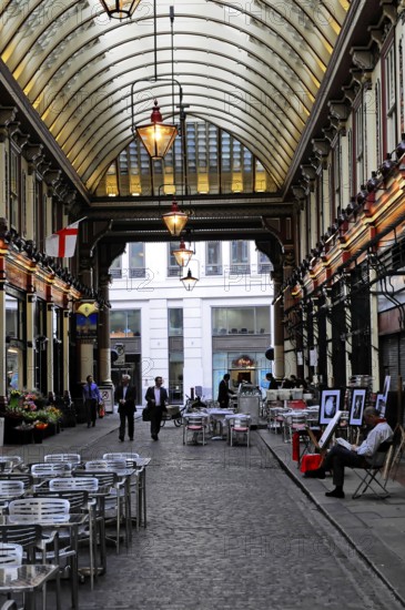 Interior view, Leadenhall Market, London, England, United Kingdom, Covered arcade street with seating and elegant lights, London, England, United Kingdom