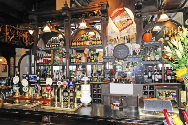 London, England, Great Britain, Interior view of a traditional pub bar with various drinks, London, England, Great Britain