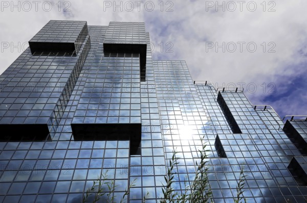 London, England, Great Britain, Modern glass building reflecting the sky and clouds, London, England, Great Britain