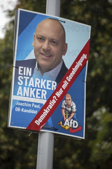 Election poster for Joachim Paul (AfD) in Ludwigshafen. The city's election committee has refused the AfD politician's candidature. A sticker with the text DEMOCRACY? ONLY WITH AUTHORISATION