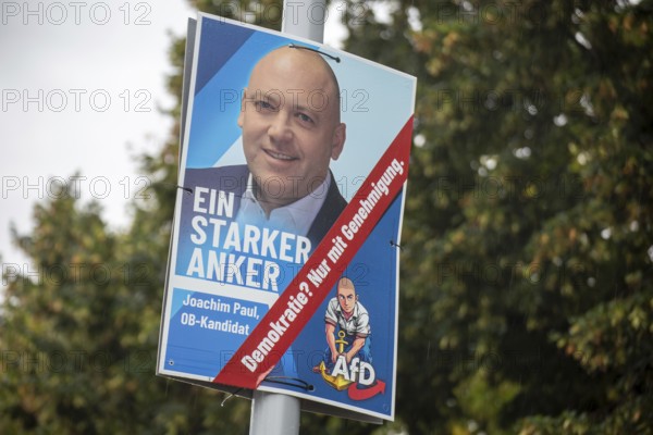 Election poster for Joachim Paul (AfD) in Ludwigshafen. The city's election committee has refused the AfD politician's candidature. A sticker with the text DEMOCRACY? ONLY WITH AUTHORISATION