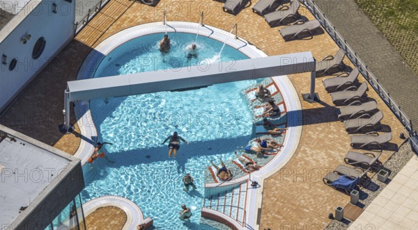 Aerial view, saltwater pool of the Olpe leisure pool, outdoor pool and indoor pool with sun loungers, Olpe town, Olpe, Sauerland, North Rhine-Westphalia, Germany